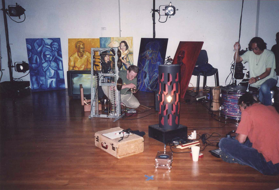 Trummerflora Collective performing in the theater of Sushi Performance and Visual Art 2001