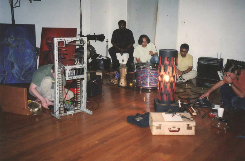 Trummerflora Collective performing in the theater of Sushi Performance and Visual Art 2001