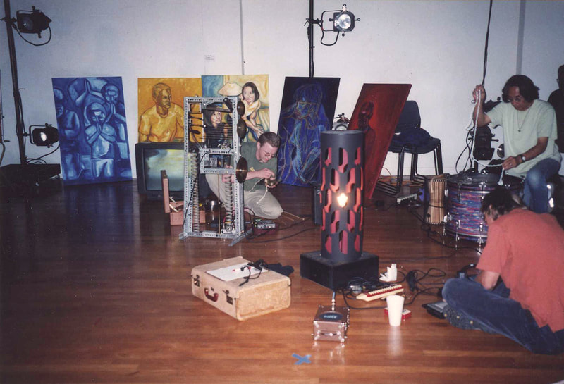 Trummerflora Collective performing in the theater of Sushi Performance and Visual Art 2001